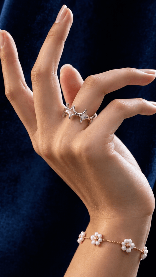 Example virtual ring try on still with a silver star ring on a hand
